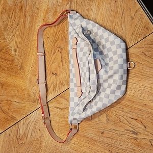 Checkered cross body sling.